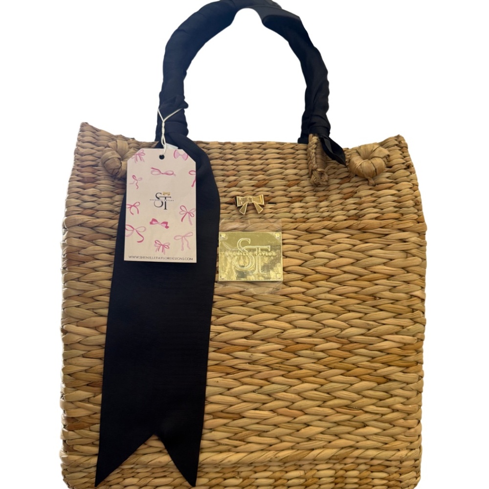 Small size straw envelope style handbag with black ribbon